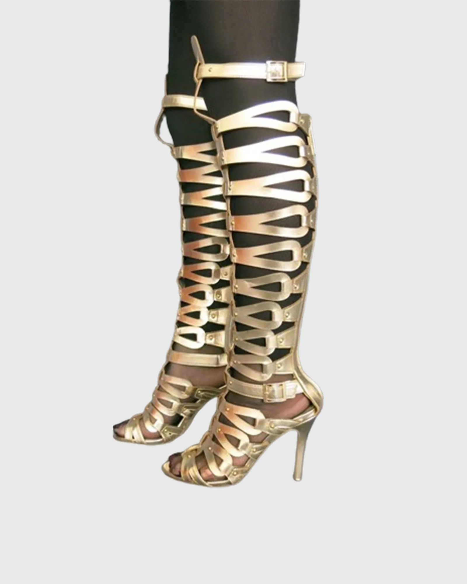 Gessica Rivet Cutout Knee High Boots In Gold